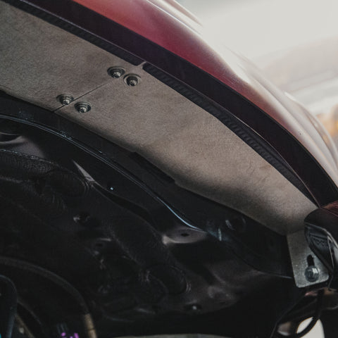 View from below of the passenger side High Clearance Fender Liner.