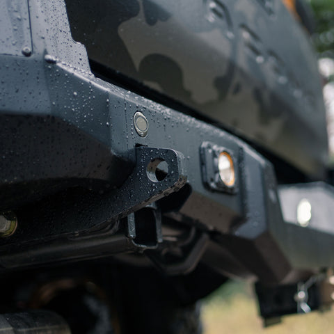 Low angle view showing the thick tow points included in the C4 Overland bumper for Tacomas.