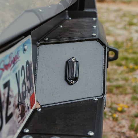 Close-up view of the tag light on the C4 Overland rear bumper for Tacomas.