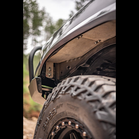 Replacing the factory plastic fender liners, C4's aluminum liners protect the air intake from water and dust.