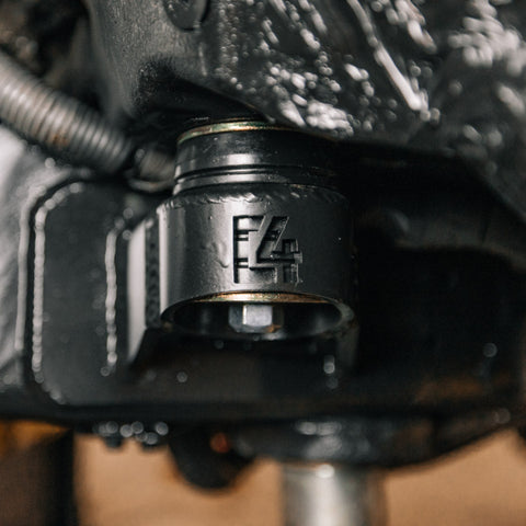 Improving tire clearance, the body mount relocation kit from C4 requires cutting off the old mount and welding in the new system.