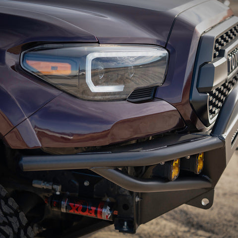Purple Tacoma with C4 Hybrid front winch bumper.