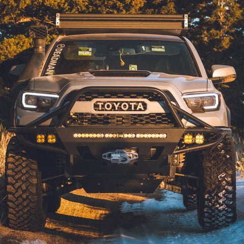 White Tacoma with C4 bumper.