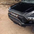 High-angle view of installed 4th gen Tacoma Rock Runner Front Bumper with plate sides and low bar option