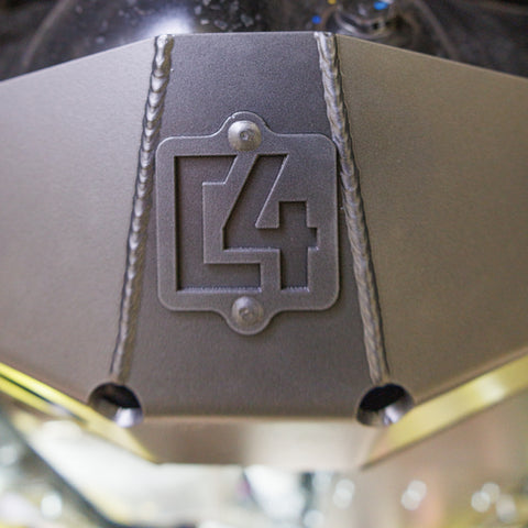 Close-up of the C4 logo on and welds on the back of the Rear Differential Skid Plate for the 4th Gen Tacoma.
