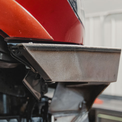 Trimmed and capped C4 Overland bumper after modification to match the new wheel well opening after the C4 HCFL kit has been installed.