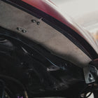 View from below of the passenger side High Clearance Fender Liner.