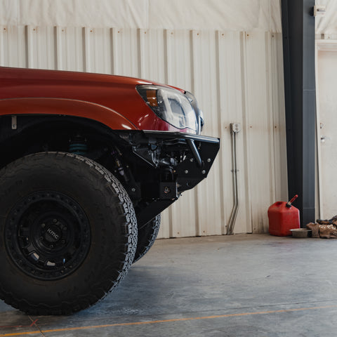 Side view of the C4 Rock Runner bumper on the 2nd Gen Tacoma with tube sides.
