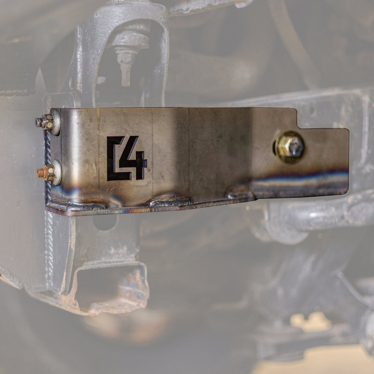 Cover photo for the C4 Frame Support bracket for the 2nd Gen Tacoma with the background faded out and emphasis on the bracket.