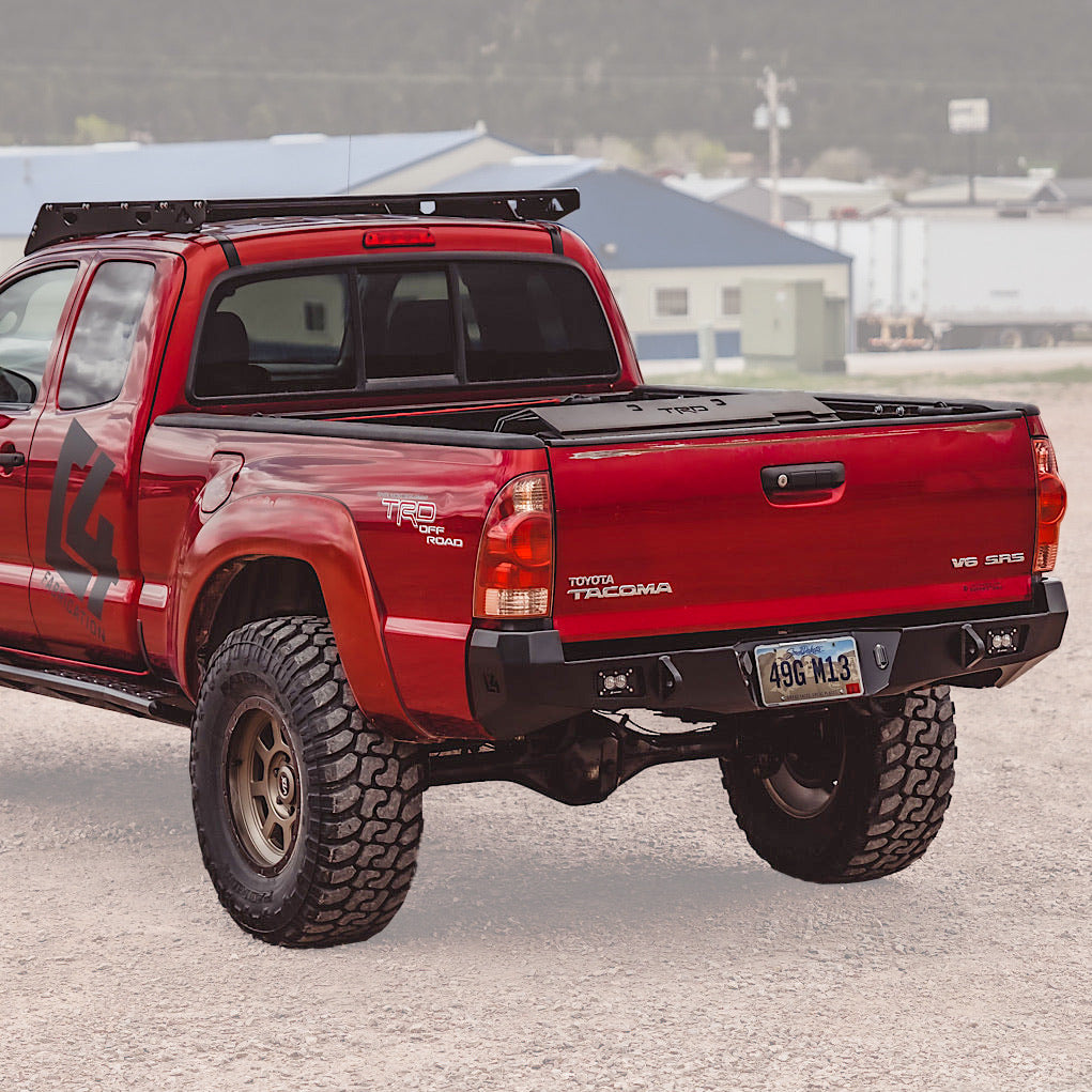 Cover photo for the C4 Overland Rear Bumper for the 2nd Generation Toyota Tacoma with the truck and bumper emphasized and the rest of the photo faded out.