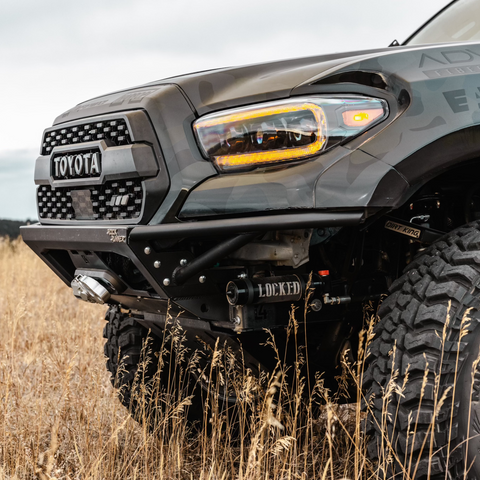 C4 Rock Runner front bumper on a wide-body Tacoma.