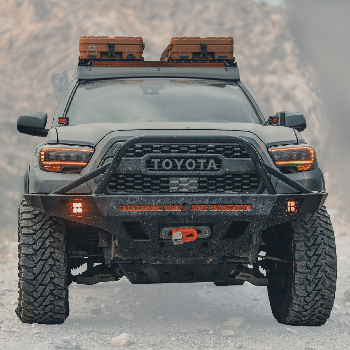 Cover photo of the C4 Overland bumper for the 3rd Generation Toyota Tacoma with the background faded out and emphasis on the truck and bumper.