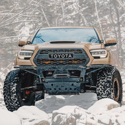 Cover photo for the C4 Rock Runner bumper for the 3rd Gen Toyota Tacoma with the background blurred out and emphasis on the bumper and truck.