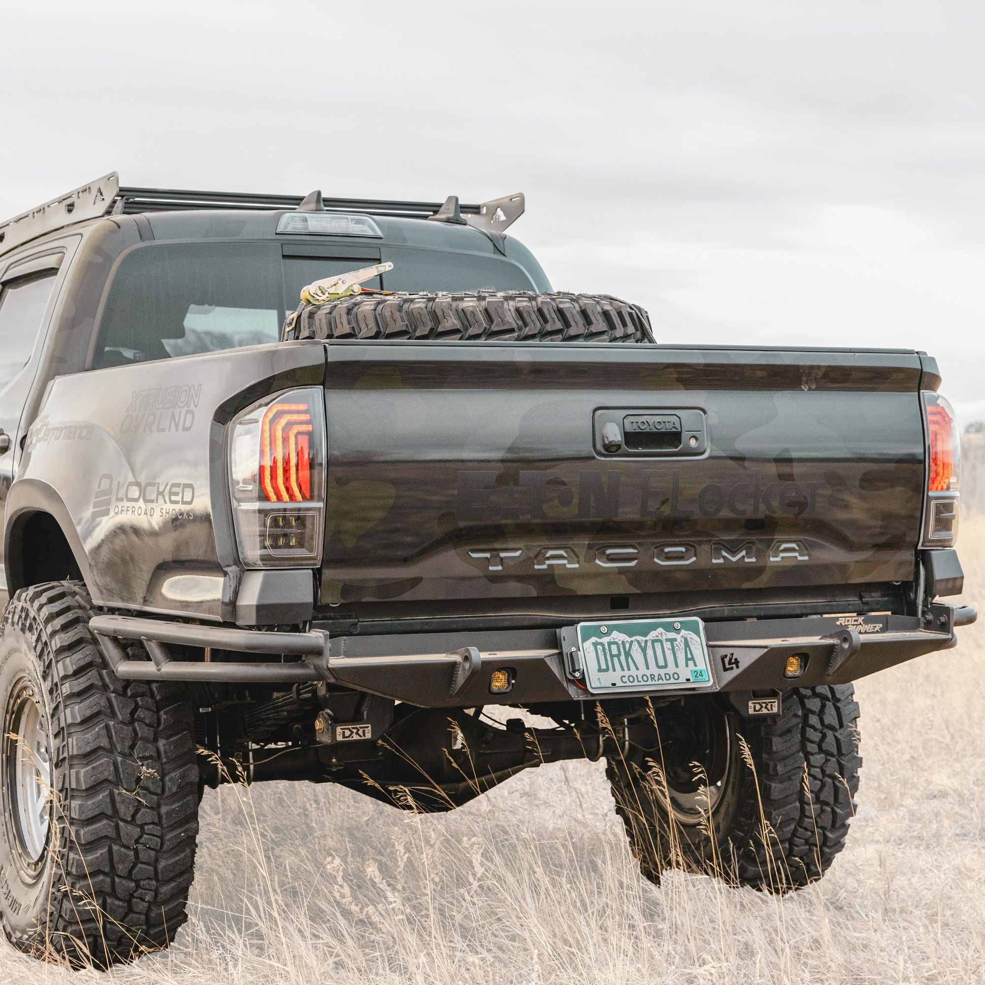 Cover photo of the C4 Rock Runner High Clearance Rear Bumper with the background faded out and the truck and bumper emphasized. 