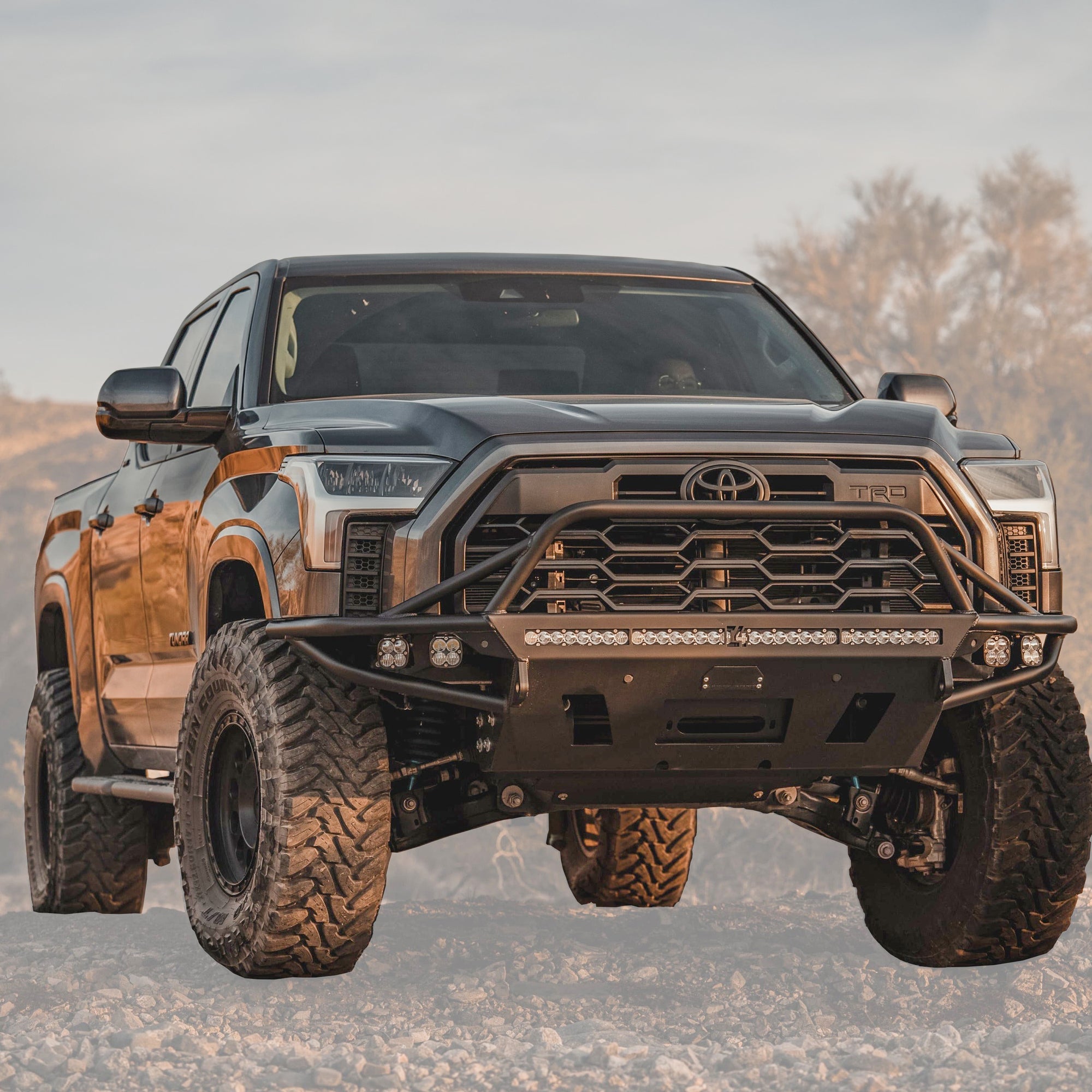 Cover photo of the C4 Hybrid winch bumper on a black 2022+ Tundra with the background faded out and emphasis on the bumper and truck.