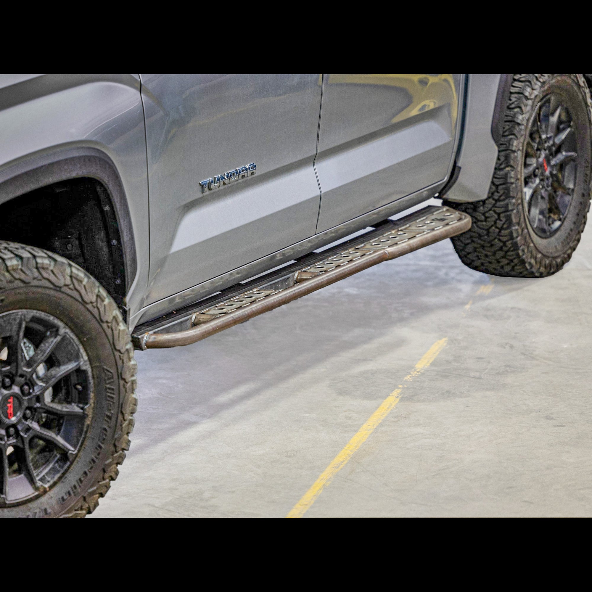 Cover photo of the C4 Sliders for the 3rd Generation Tundra with the background faded out and the sliders and truck emphasized. 