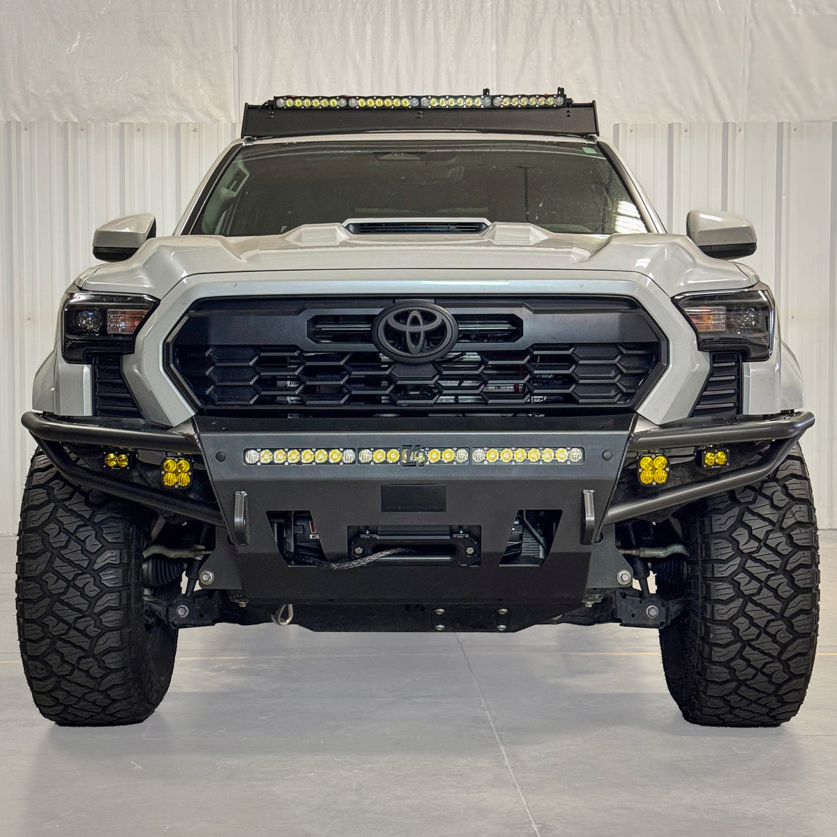 Cover photo for the C4 Hybrid front winch bumper for the 4th Generation Tacoma with the background faded out to emphasize the bumper.