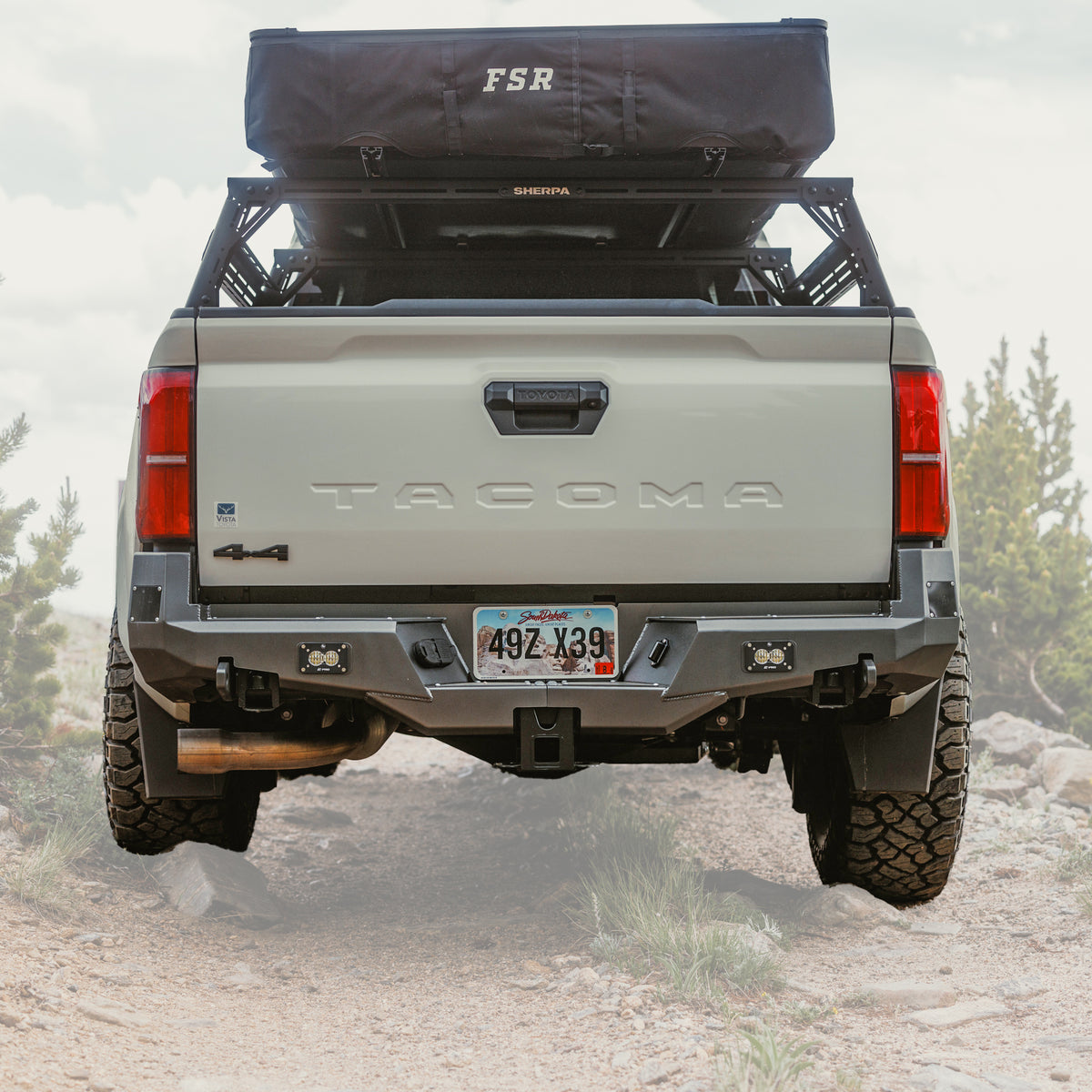 Cover photo for the Overland rear bumper for the 4th Generation Tacoma emphasizing the bumper with the background faded out.