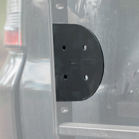 Cover photo of the C4 RotopaX mount for the Summit Hatch Ladder with the background faded out and emphasis on the mount itself. 