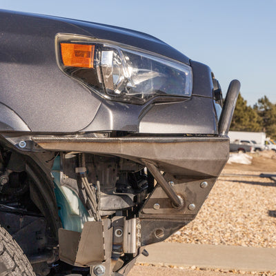 Close-up side view of the Rock Runner front bumper showing the angle of the available mid-height bull bar.