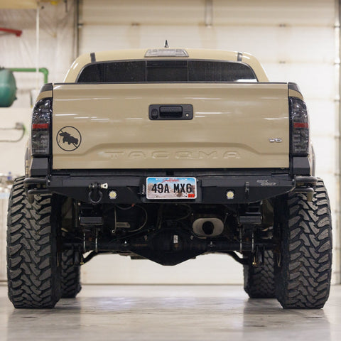 Rear view of the C4 Rock Runner High Clearance bumper showing its extreme increase in ground clearance. 