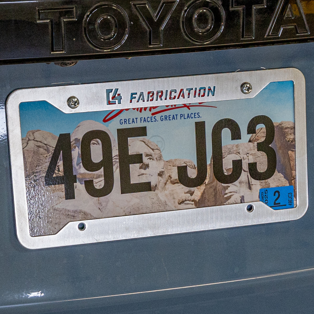 C4 License Plate Frame installed on a 2024 Land Cruiser LC250.