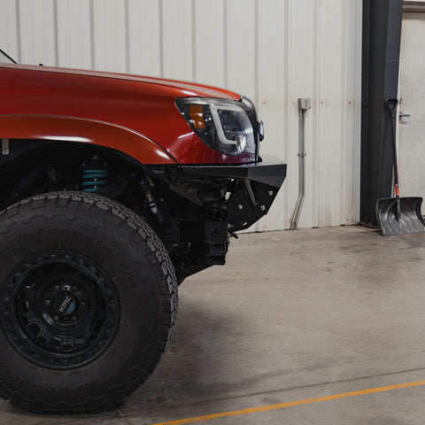 View from the side showing the plate side version of the C4 Rock Runner bumper for 2005+ Tacomas.