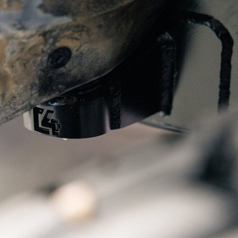 View of the C4 Body Mount Relocation kit and its weld-on frame reinforcement plate. 