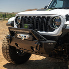 DV8 Xtract 12k Synthetic Rope Winch fits standard winch mounting points.