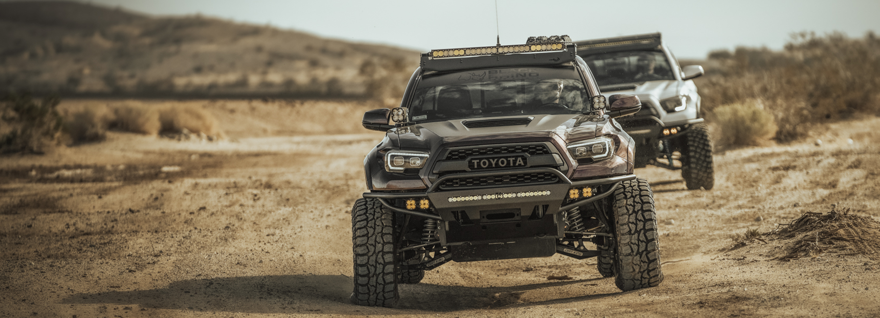 3rd Generation Toyota Tacoma with c4 fabrication hybrid off-road steel bumper with bull bar and off-road lights made for the trails and overlanding camping products adventure off-road products rooftop tent wheels trail riding