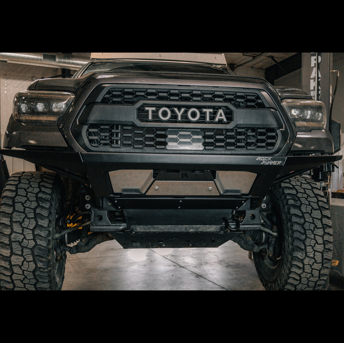 Close up of the C4 Rock Runner front bumper for the 3rd Generation Toyota Tacoma with plate sides and winch block-off.