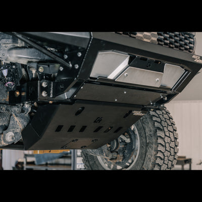 Low angle view of the C4 Rock Runner front bumper with front skid and crossmember delete giving extreme front approach angle.