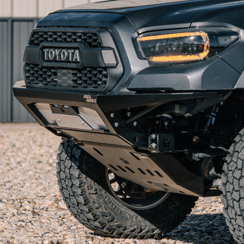 Quartering front angle showing the smooth transition from the C4 Rock Runner front bumper to the C4 Rock Runner front skid plate with the front crossmember delete. 