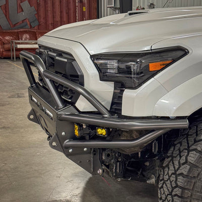 Side view of the C4 2024+ Tacoma hybrid bumper with mid-height bull bar and tube gussets.