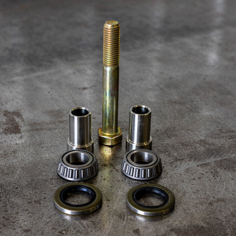 Close up view of all the components of the C4 swing arm bearing rebuild kit.