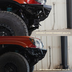 Comparison of before and after of the C4 front crossmember delete for the Rock Runner front skid plate showing the drastic change in approach angle that results.