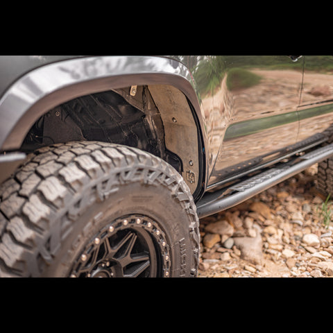 View back into the driver's fender showing the aluminum inner fender liners from C4.