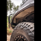 Replacing the factory plastic fender liners, C4's aluminum liners protect the air intake from water and dust.