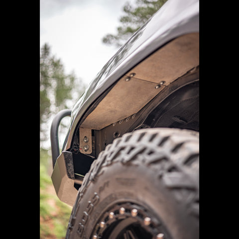 View of the mounting method of C4's aluminum inner fender liners.