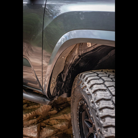 Close up of the tire clearance on the body mount after installation of the C4 OTF kit.