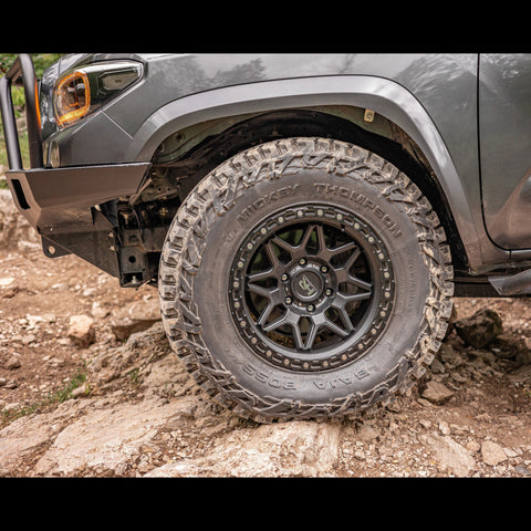 Installed OTF kit showing the clearance afforded 35" tires.