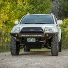Slightly angled front view showing the C4 Overland winch bumper with low bull bar for the early 4th Generation Toyota 4Runner.