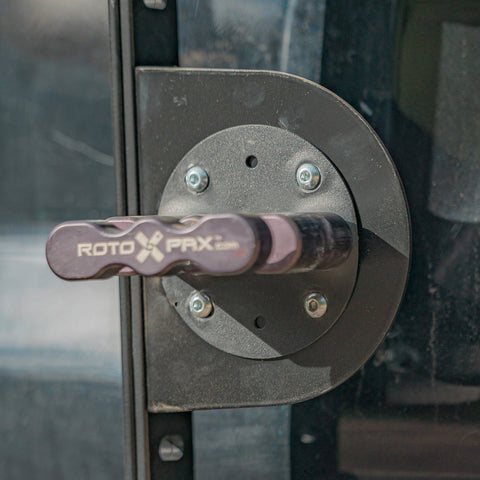 Close-up view of the C4 mount equipped with a RotopaX brand pack mount, an available accessory for the Summit hatch ladder. 