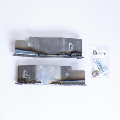 Parts included with the C4 Frame Support Bracket for 2nd Gen Tacoma laid out on a white table.