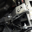 Low angle view of an installed Tacoma frame support bracket from C4 Fabrication.