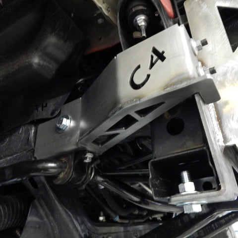 Low angle view of an installed Tacoma frame support bracket from C4 Fabrication.