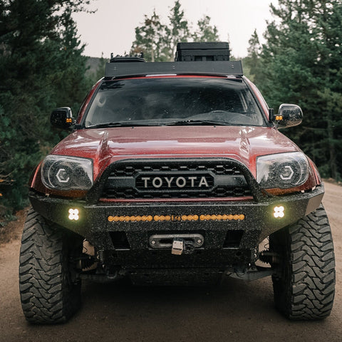 Front view of a maroon 4Runner Overland Series Front Bumper 4th Gen 2003-2009