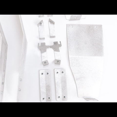 Close ups of the brackets in the C4 High Clearance Fender Liner kit.