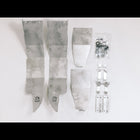 All of the contents of the C4 High Clearance Fender Liner kit laid out on a white table.