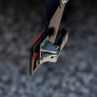 Close-up view of the heavy duty latch used on all C4 swing-out bumpers as well as the anti-rattle pads that serve as the contact point between the swing-out and the bumper.